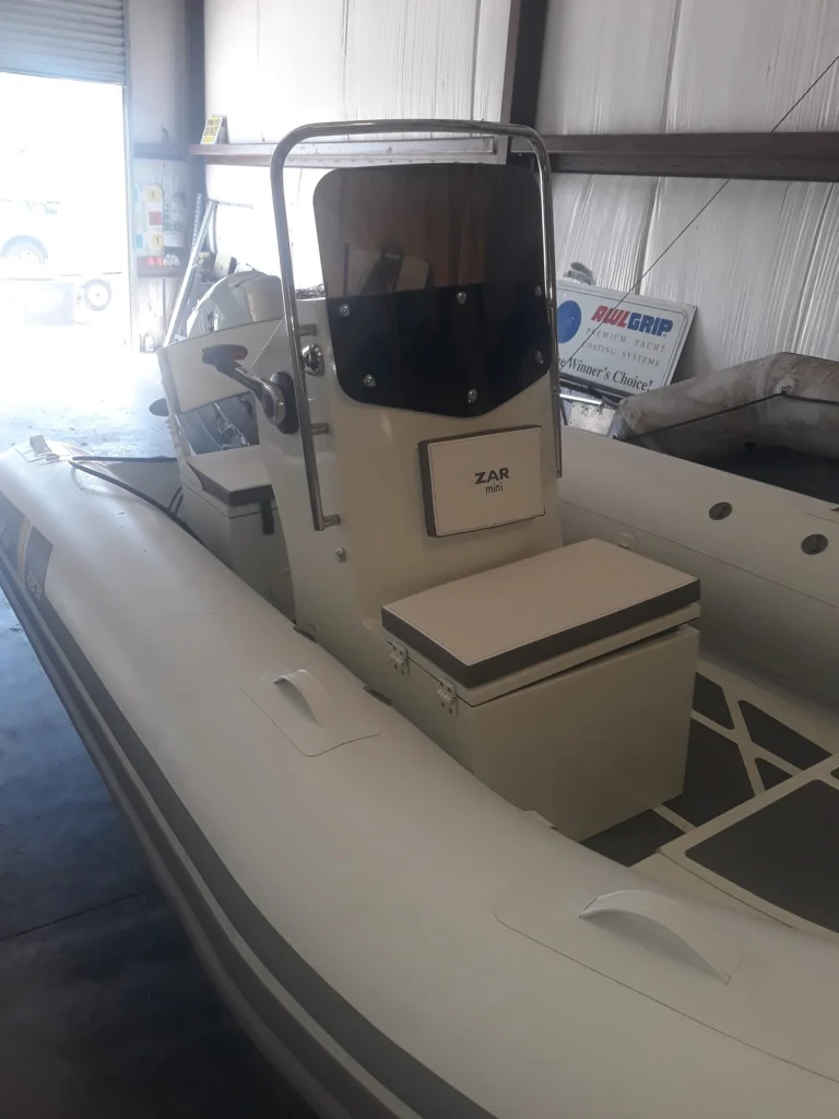 Zar Mini Rib 14 console and seating, bow view