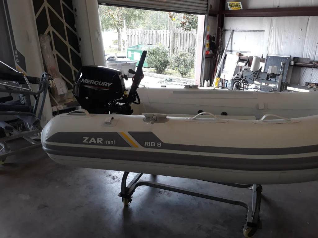 Zar Mini rib with a Mercury outboard, side view
