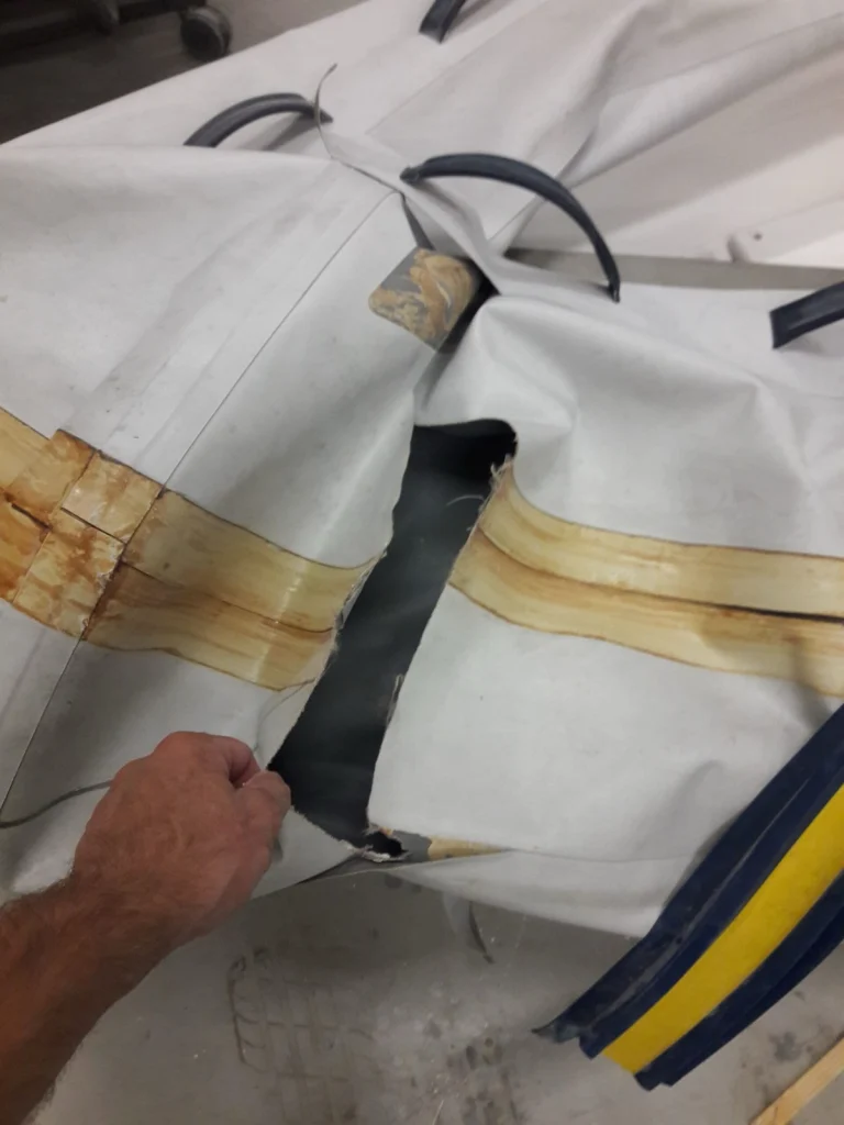 Inflatable tube patch repair in progress
